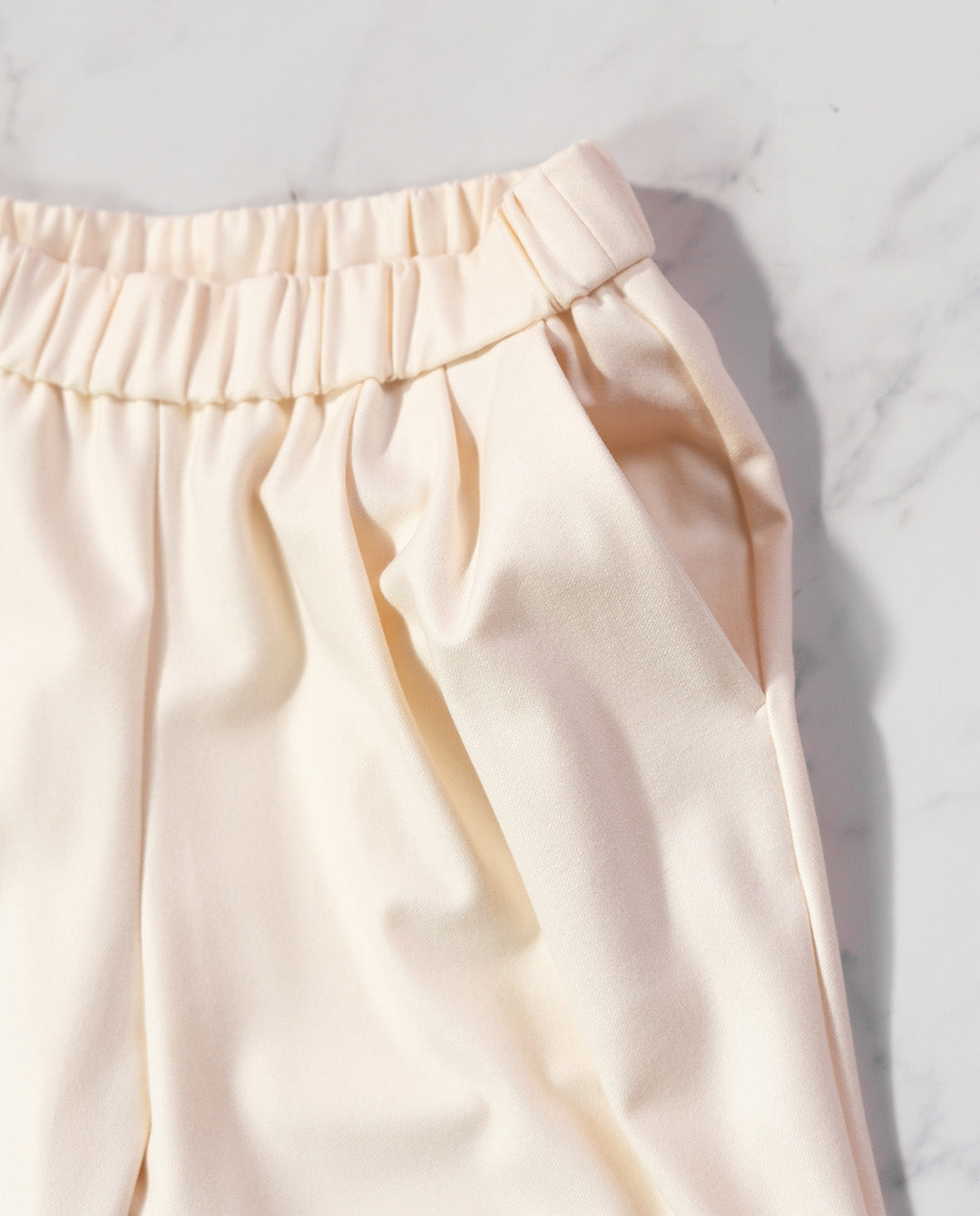 両面起毛テーパードパンツ