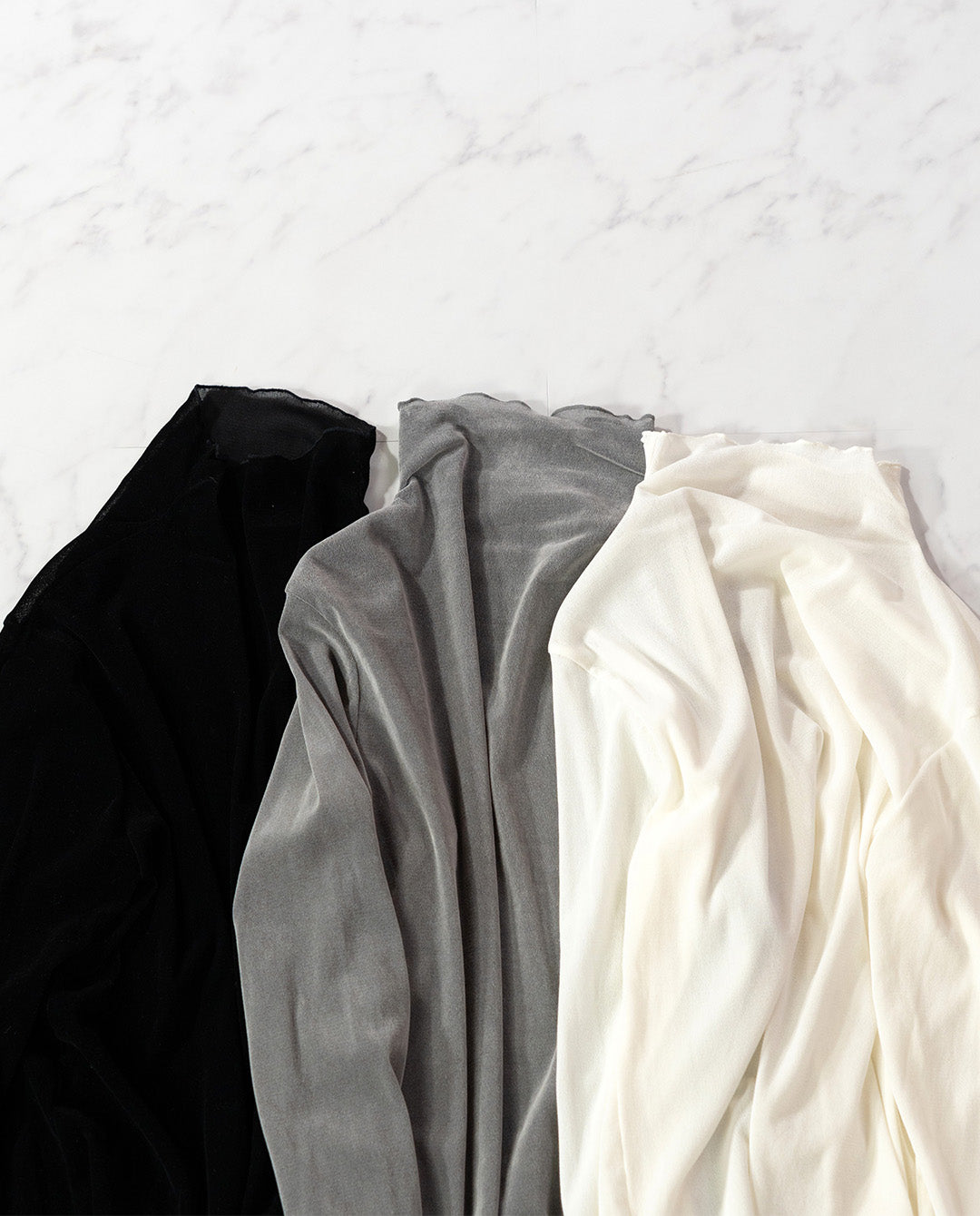 フロッキーチュールトップス