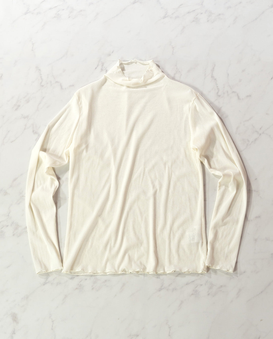 フロッキーチュールトップス